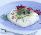Cod fillet in blue plate — Stock Photo