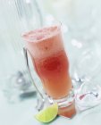 Cranberry cocktail in glass — Stock Photo
