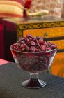 Dried cranberries in bowl — Stock Photo