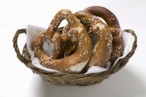Salted pretzels in bread basket — Stock Photo