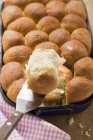 Closeup view of sweet yeast Buchteln dumplings in a roasting tin — Stock Photo