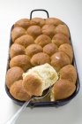 Closeup view of sweet yeast Buchteln dumplings in roasting tin — Stock Photo