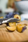 Sliced fresh plums — Stock Photo