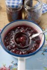 Cherry jam in pan — Stock Photo