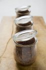 Chocolate puddings baked in jars — Stock Photo