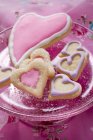 Heart-shaped biscuits in glass bowl — Stock Photo