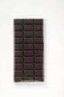 Barra de chocolate negro - foto de stock