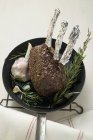 Rack of venison with garlic — Stock Photo