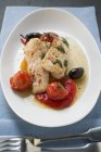 Monk-fish fillets with cherry tomatoes — Stock Photo
