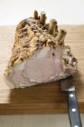 Rack of pork on chopping board — Stock Photo