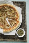 Onion pizza oregano beside it — Stock Photo