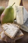 Pieces of Appenzeller and blue cheese — Stock Photo