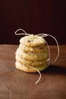 Pile of tied cranberry cookies — Stock Photo