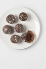 Chocolate muffins on plate — Stock Photo