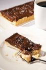 Piece of Chocolate Hazelnut Tart — Stock Photo