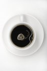 Кава в білій чашці — стокове фото