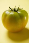 Green ripe tomato — Stock Photo