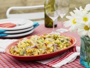 Closeup view of sweetcorn and prawn salad in oval bowl — Stock Photo