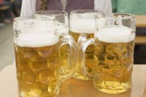 Quatro litros de cerveja — Fotografia de Stock