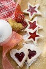 Heart- and star-shaped biscuits — Stock Photo