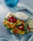 Crudites with a California dip on blue wooden suface — Stock Photo