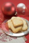 Christmas biscuits on silver plate — Stock Photo