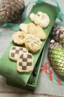 Christmas biscuits on green box — Stock Photo