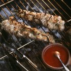 Pesce monaco alla griglia con rosmarino e aglio — Foto stock