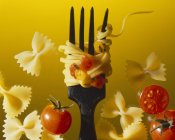 Thin tagliatelle pasta on fork — Stock Photo