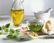 Pesto sauce and ingredients — Stock Photo