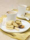 Christmas biscuits with hot chocolate — Stock Photo