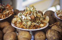 Plates of fried potato chips — Stock Photo