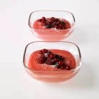 Closeup view of berry desserts in glass bowls — Stock Photo