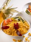 Cornflakes with fresh fruits — Stock Photo