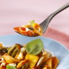 Spicy pasta shells with tomatoes — Stock Photo
