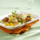 Steamed cod fillet with vegetables — Stock Photo