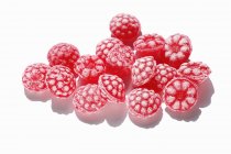 Raspberry sweets on white — Stock Photo