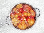 Ripe Apricots in colander — Stock Photo