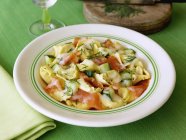 Tortellini pasta with salmon and dill — Stock Photo