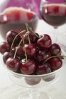 Cherries in glass bowl — Stock Photo