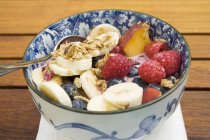 Muesli with berries and banana — Stock Photo