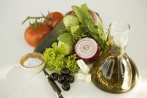Fresh vegetables with oil — Stock Photo