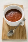 Tomato soup in cup — Stock Photo