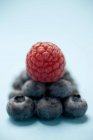 Fresh ripe blueberries and raspberry — Stock Photo