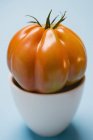 Red Tomato in bowl — Stock Photo