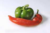 Green and red chili pepper — Stock Photo