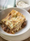 Portion of mince lasagne — Stock Photo