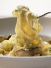Tagliatelle pasta with ceps — Stock Photo