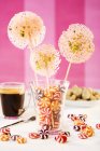 Closeup view of lollies and peppermint bonbons in glass — Stock Photo
