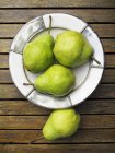 Plate of fresh pears — Stock Photo